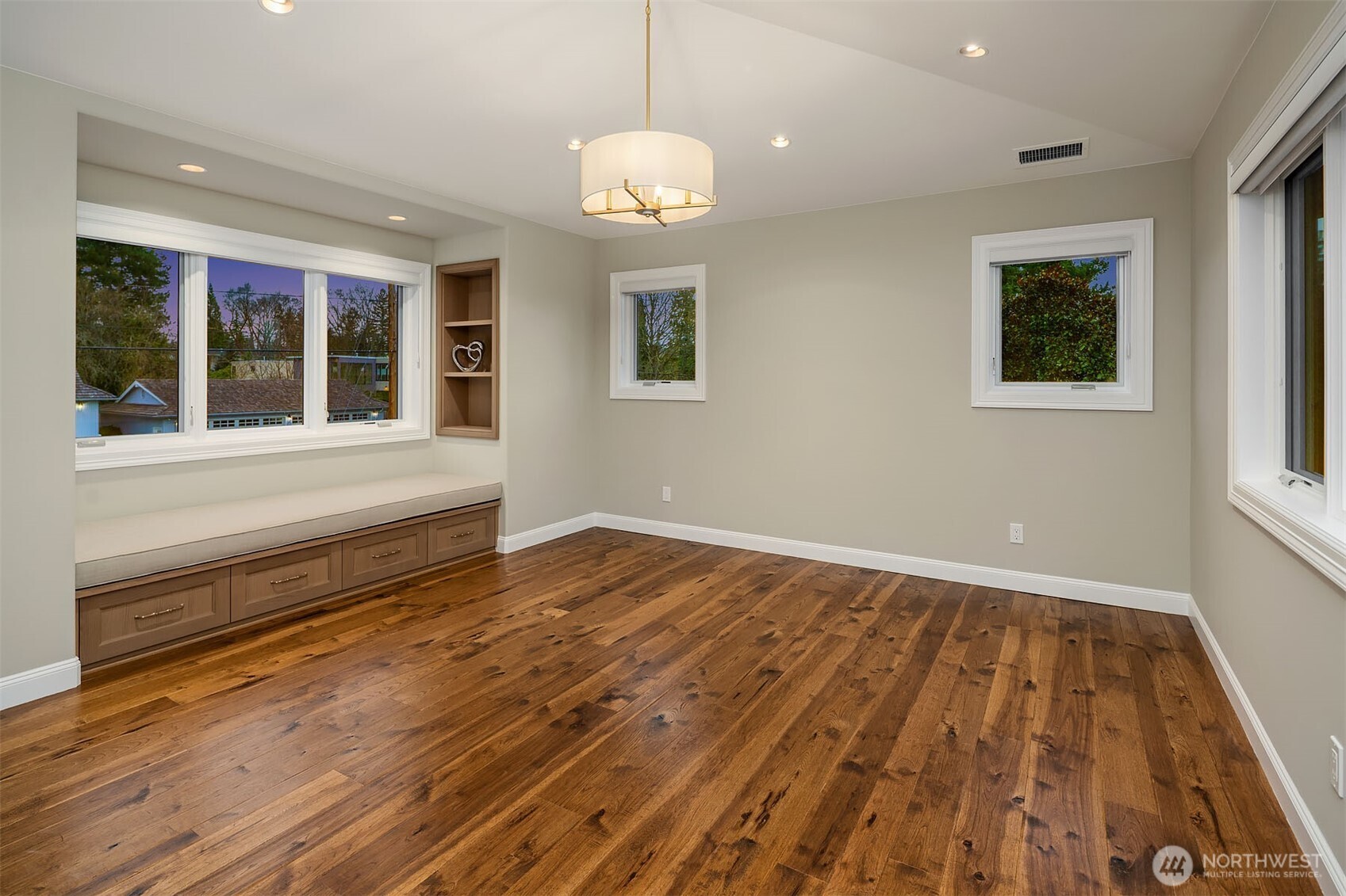 854 Evergreen Point Road Medina, WA 98039 - Photo 19 of 40 a view of a room with wooden floor and window