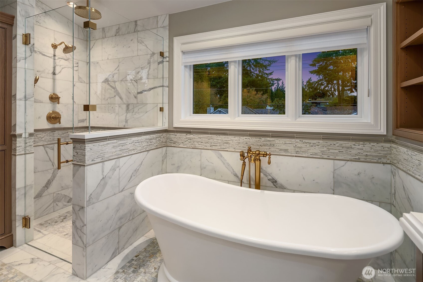 854 Evergreen Point Road Medina, WA 98039 - Photo 21 of 40 a white bath tub sitting next to a window