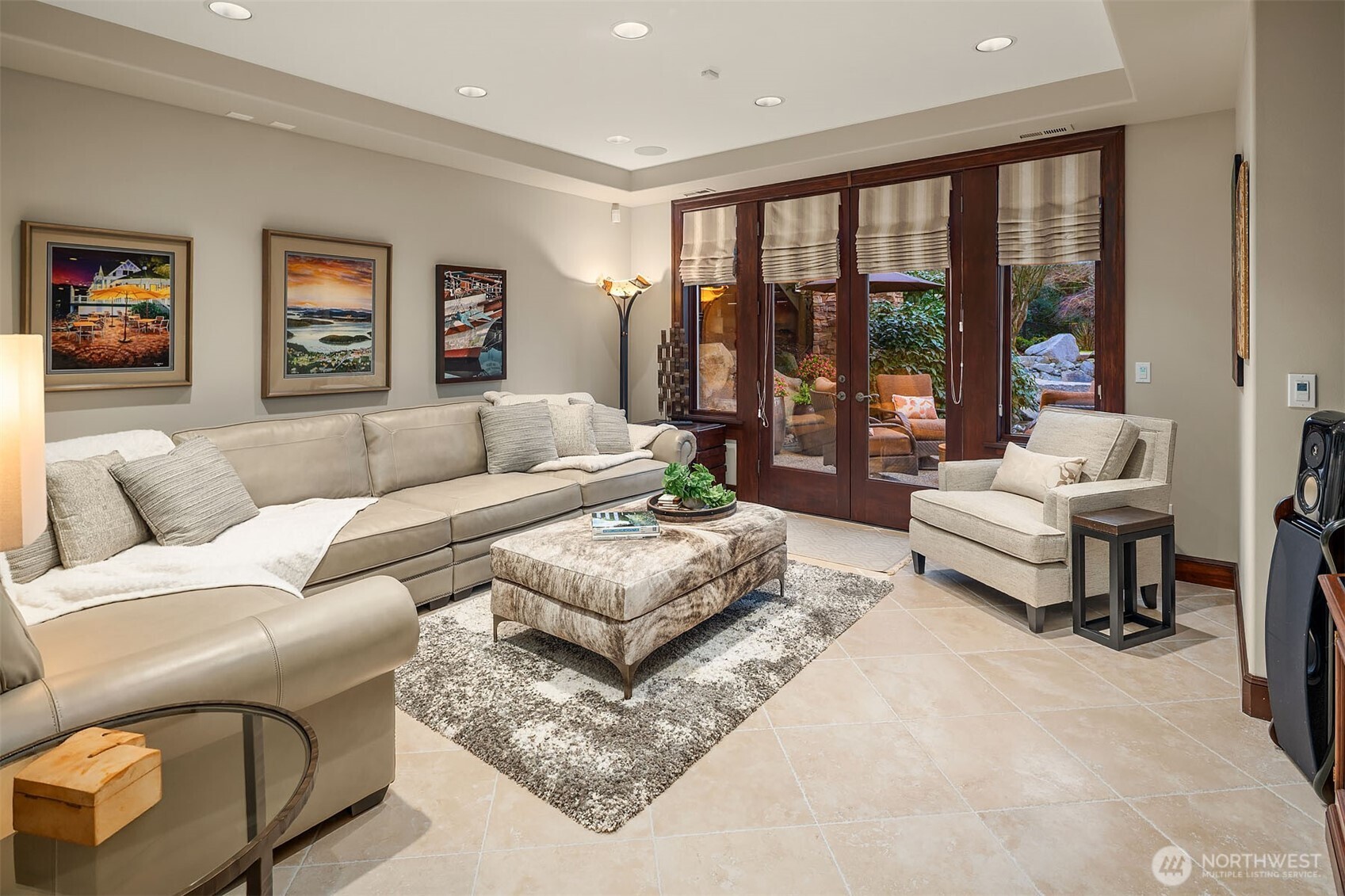 854 Evergreen Point Road Medina, WA 98039 - Photo 23 of 40 a living room with furniture and a large window