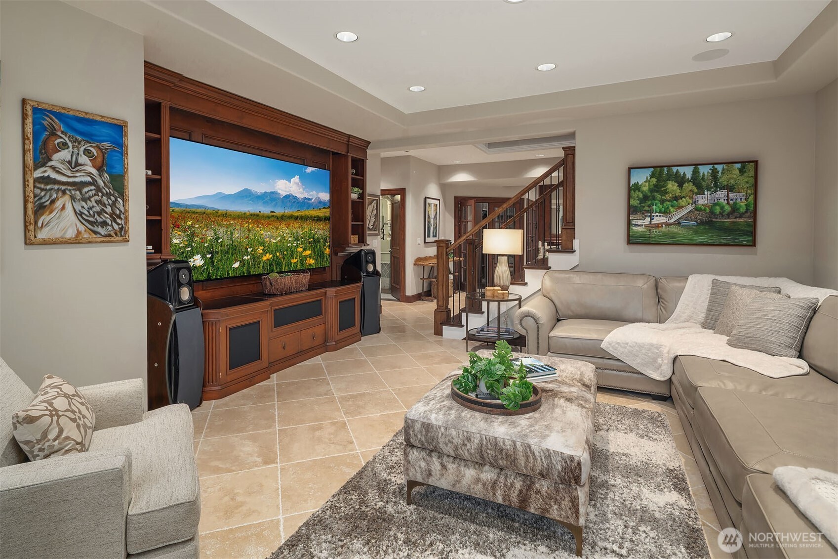 854 Evergreen Point Road Medina, WA 98039 - Photo 24 of 40 a living room with furniture and a flat screen tv