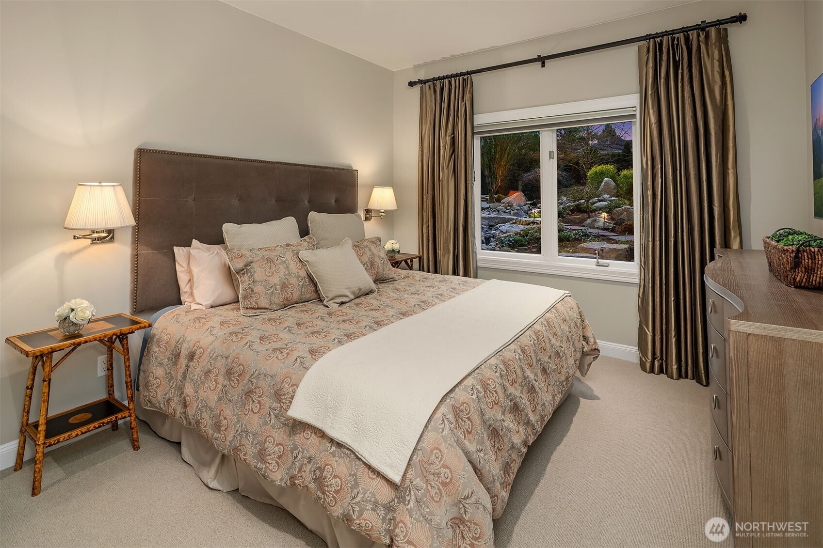 854 Evergreen Point Road Medina, WA 98039 - Photo 28 of 40 a bedroom with a bed and a window