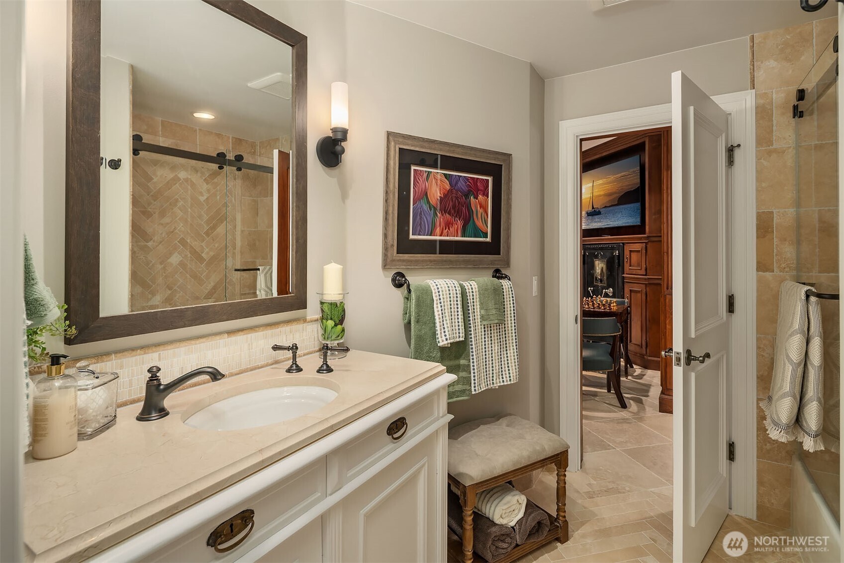 854 Evergreen Point Road Medina, WA 98039 - Photo 30 of 40 a en suite bathroom with a sink and a mirror