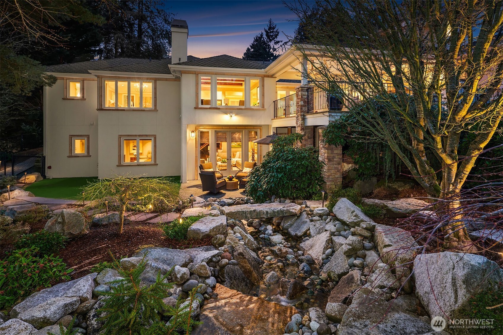 854 Evergreen Point Road Medina, WA 98039 - Photo 35 of 40 a front view of a house with a yard