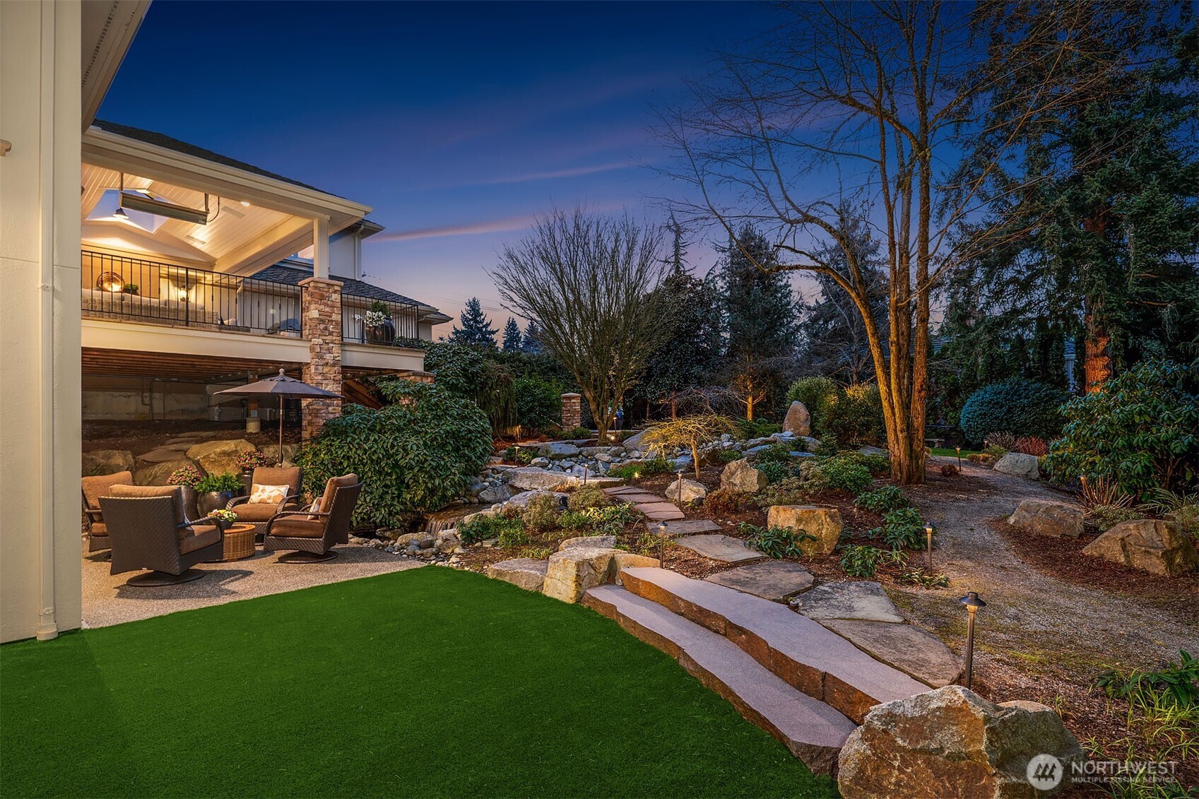 854 Evergreen Point Road Medina, WA 98039 - Photo 36 of 40 a view of a backyard with sitting area