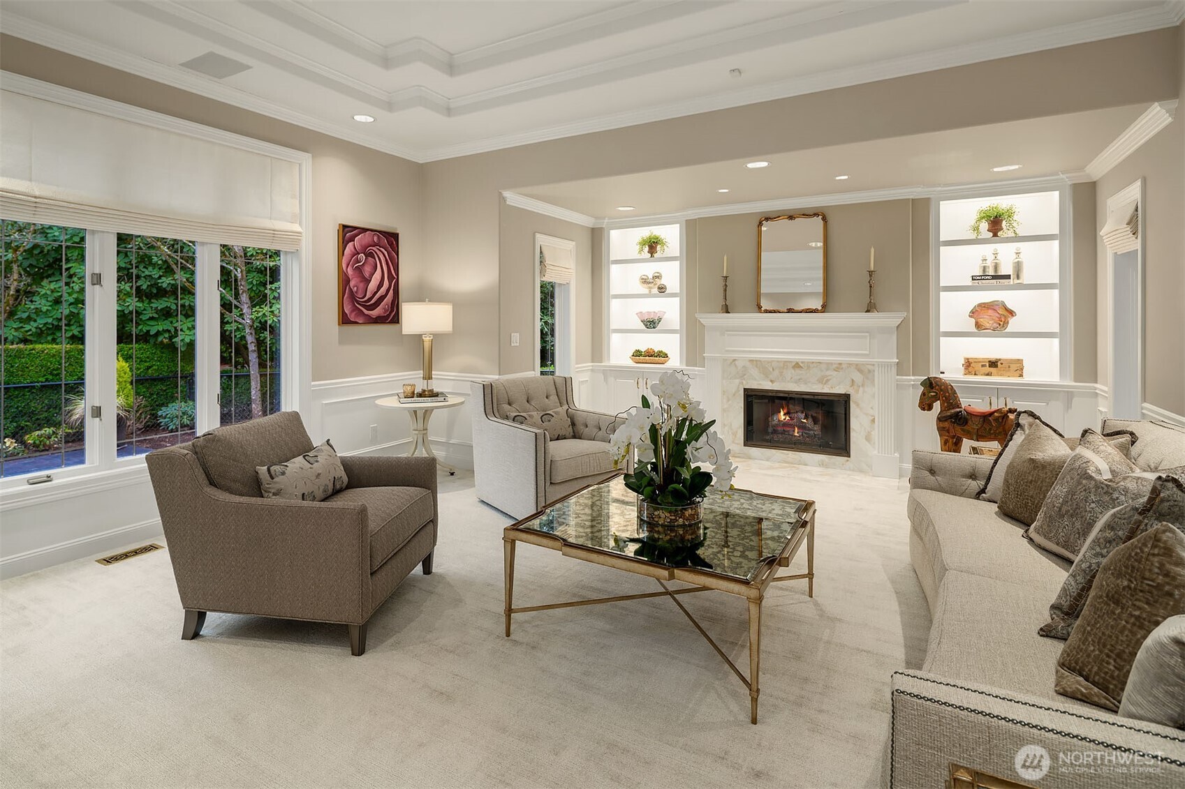 854 Evergreen Point Road Medina, WA 98039 - Photo 5 of 40 a living room with furniture and a fireplace