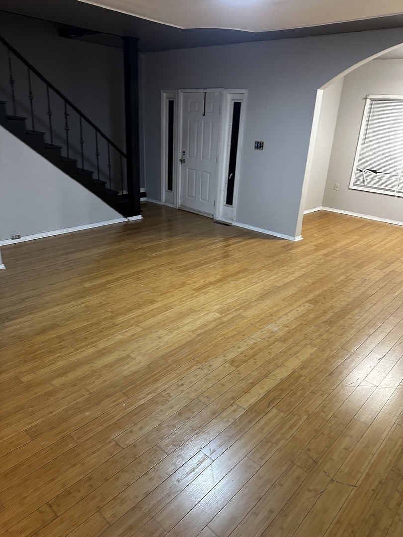 435 South Poplar Avenue Kankakee, IL 60901 - Photo 19 of 45 a view of an empty room with wooden floor