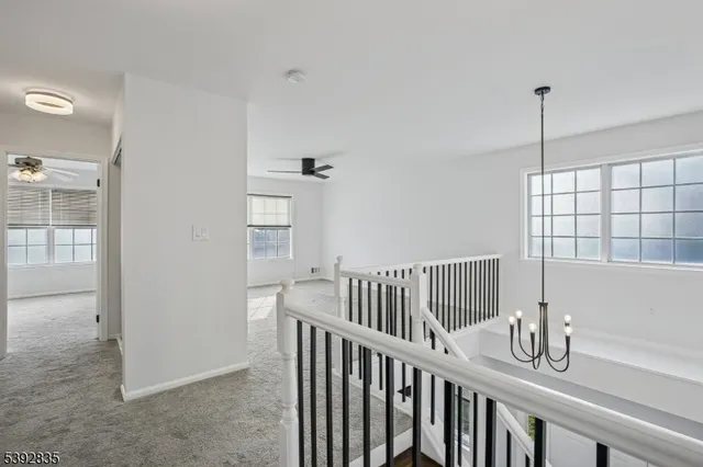 a bathroom with a sink a mirror and a toilet