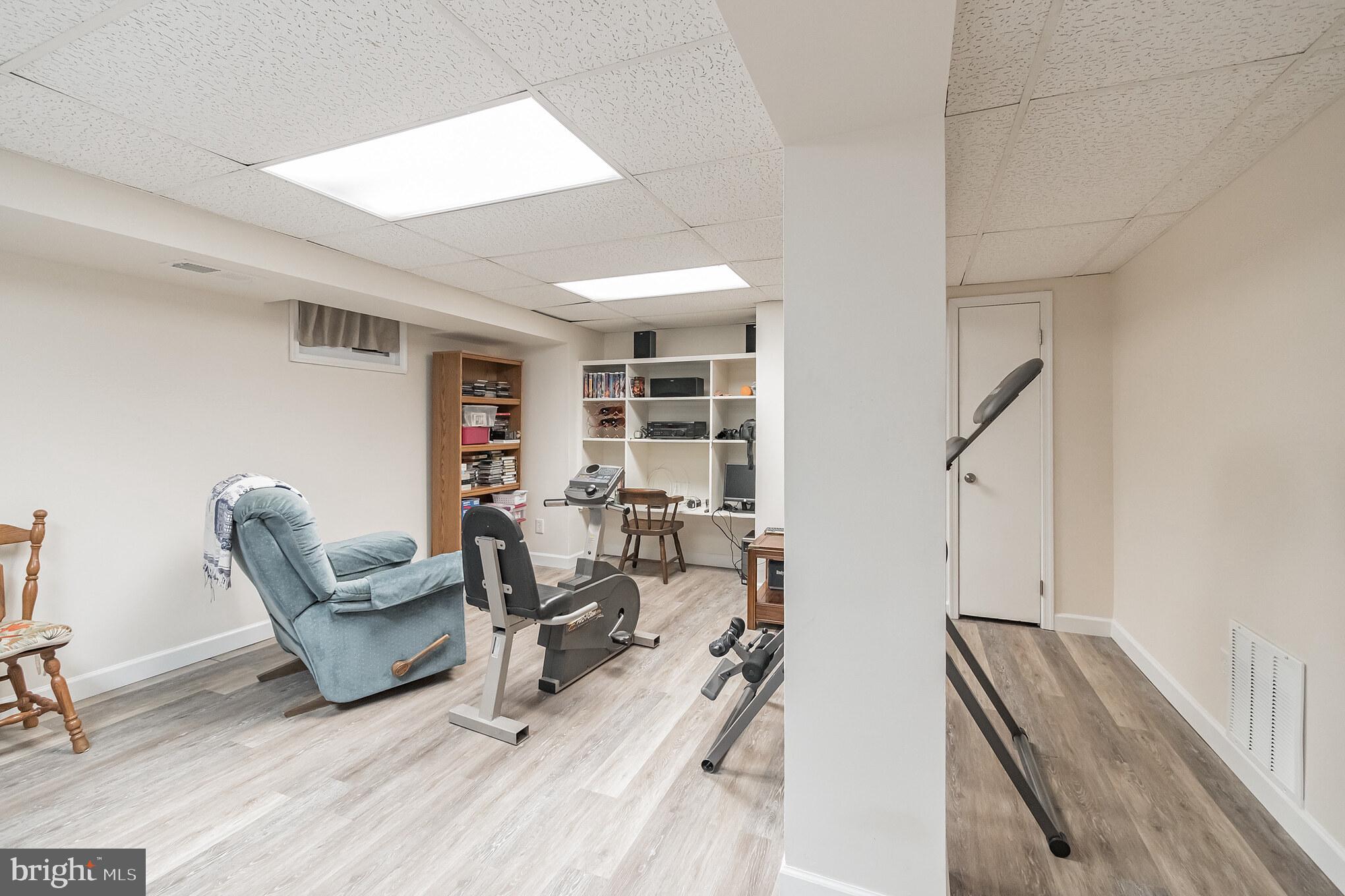 9852 Dellcastle Road Gaithersburg, MD 20886 - Photo 29 of 33 Lower Level Finished Recreation Room