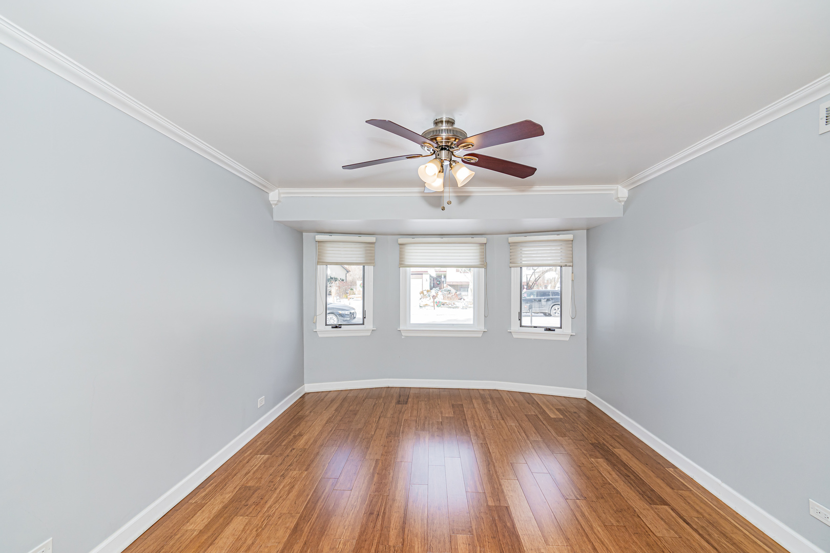 548 Harbor Terrace Bartlett, IL 60103 - Photo 16 of 42 an empty room with wooden floor and windows