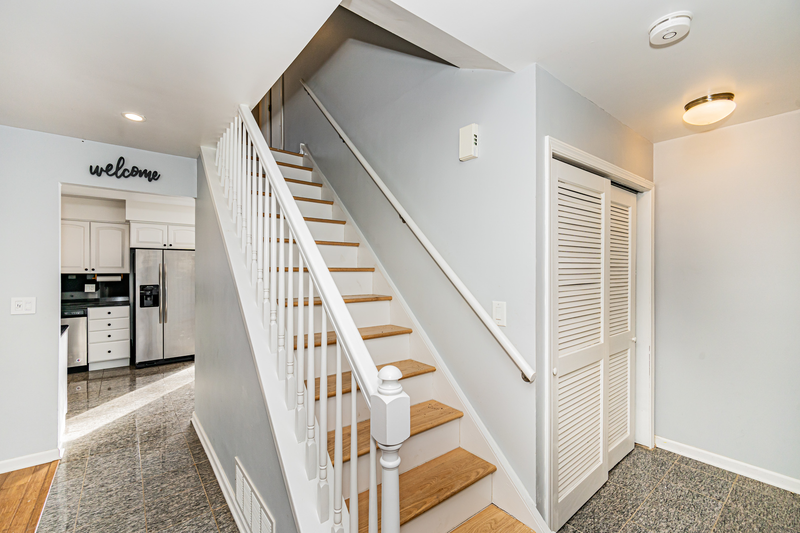 548 Harbor Terrace Bartlett, IL 60103 - Photo 18 of 42 a view of staircase with white walls and a window
