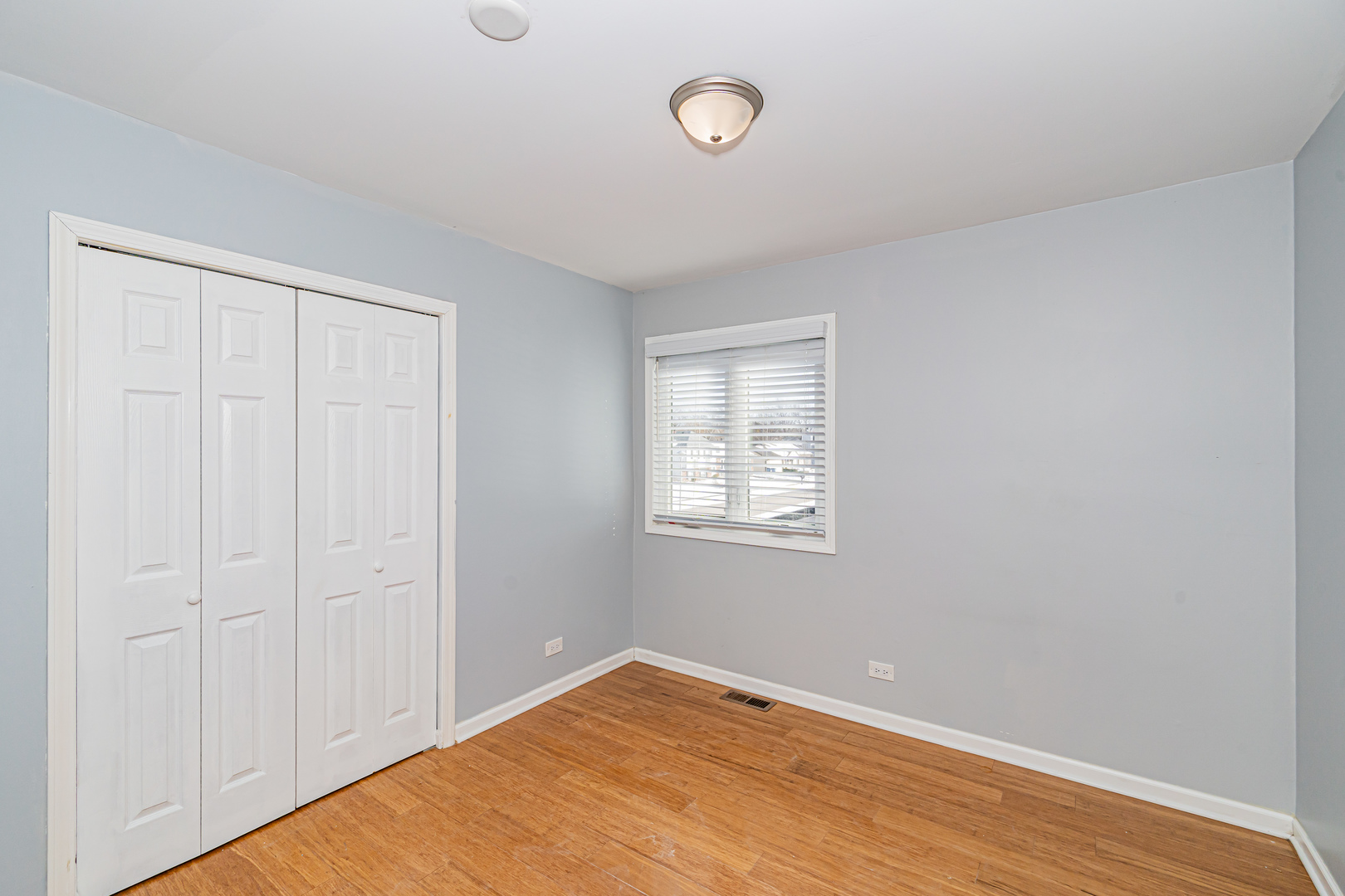 548 Harbor Terrace Bartlett, IL 60103 - Photo 25 of 42 wooden floor in an empty room with a window