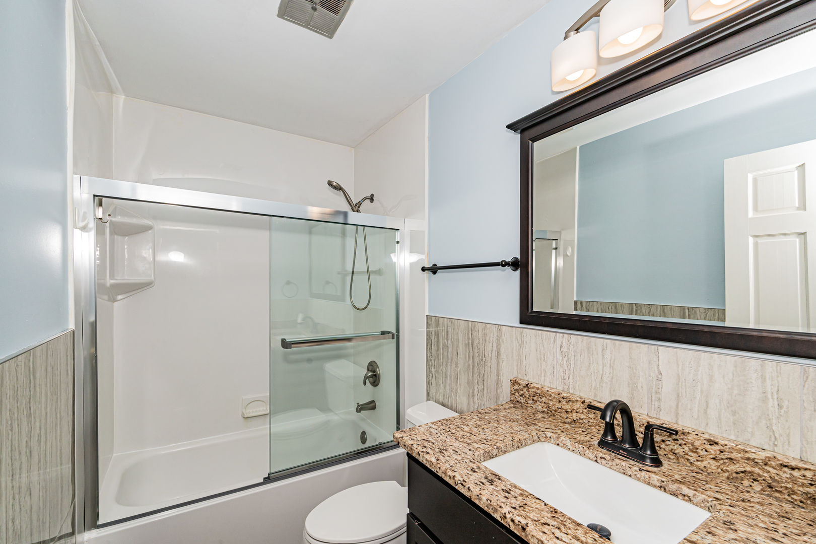 548 Harbor Terrace Bartlett, IL 60103 - Photo 28 of 42 a bathroom with a sink toilet double vanity and shower