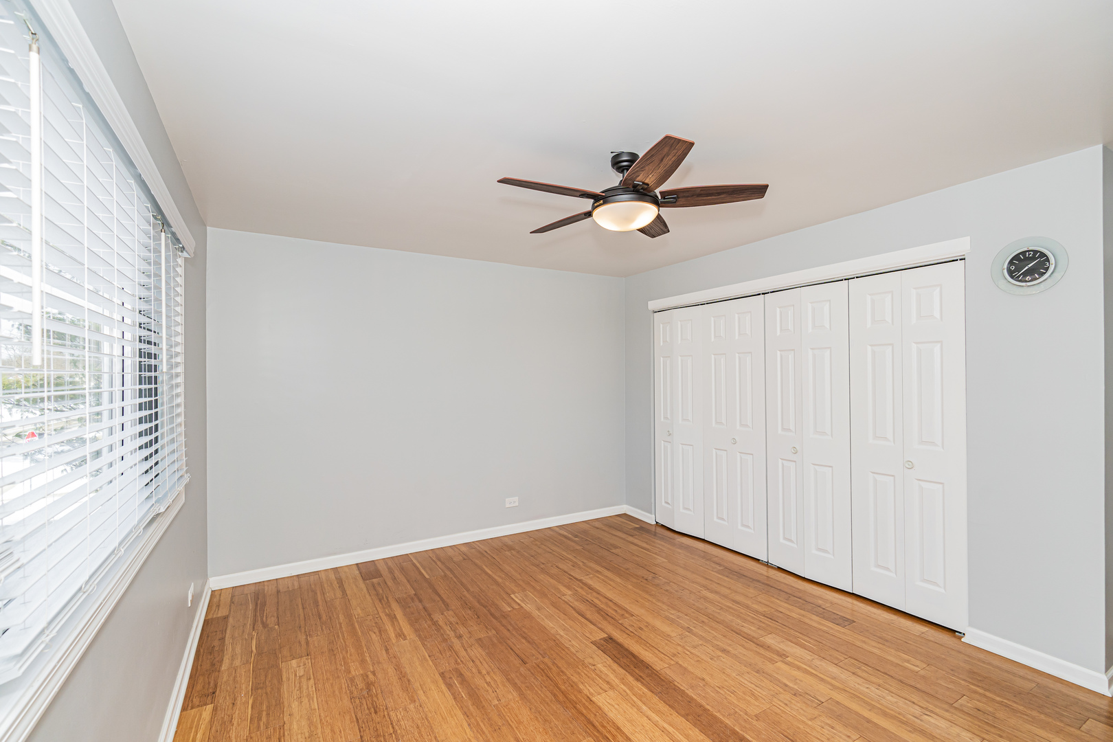 548 Harbor Terrace Bartlett, IL 60103 - Photo 29 of 42 a view of a big room with wooden floor and a window