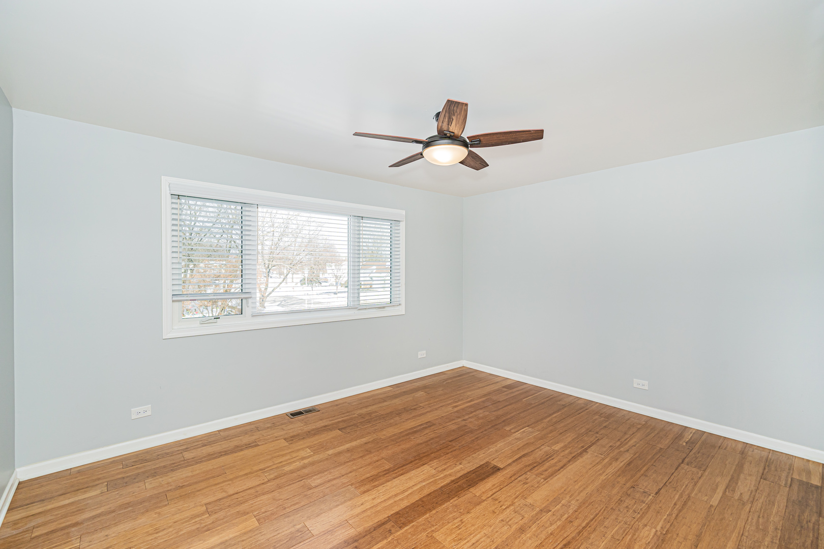 548 Harbor Terrace Bartlett, IL 60103 - Photo 30 of 42 a view of empty room with wooden floor and fan