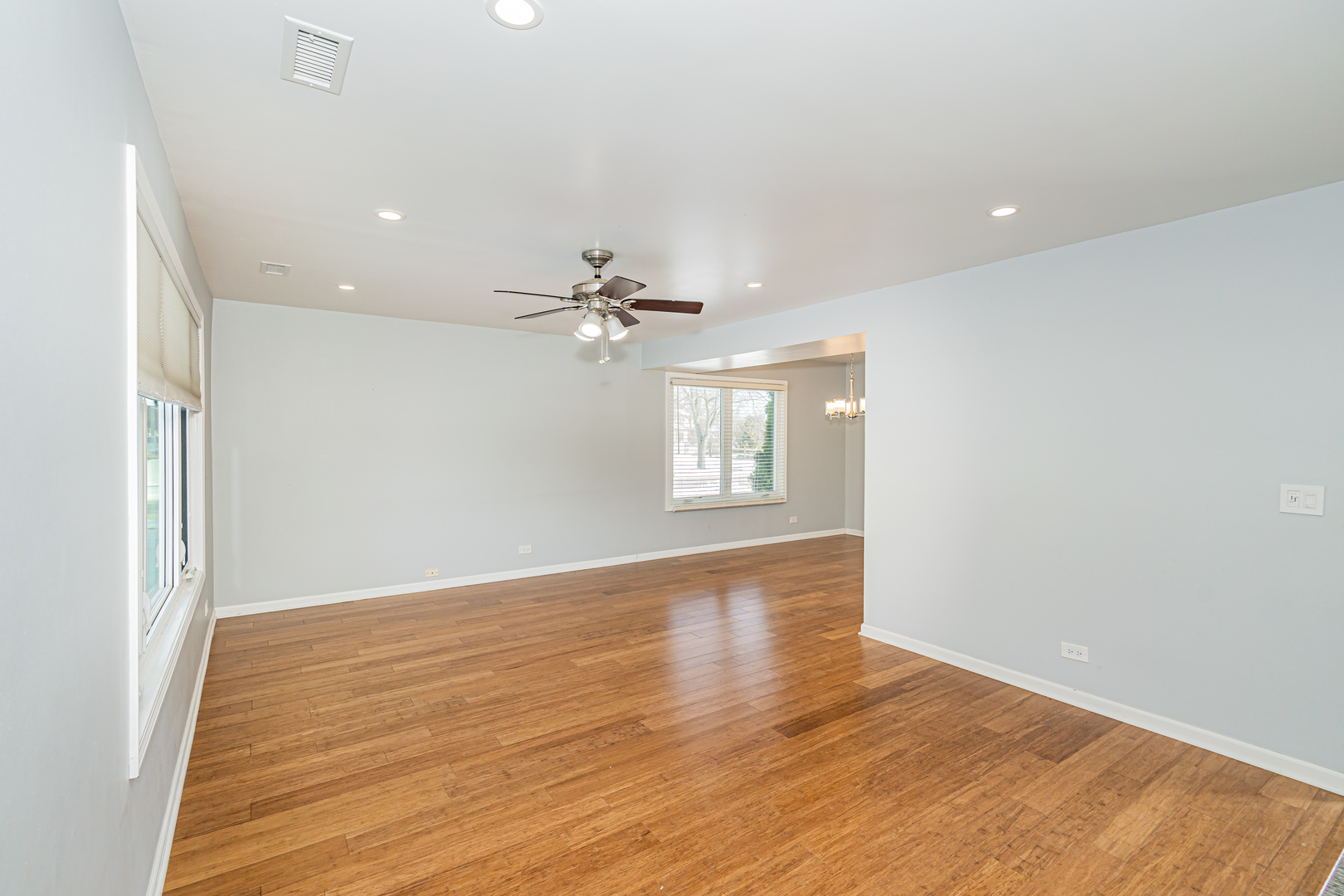 548 Harbor Terrace Bartlett, IL 60103 - Photo 3 of 42 wooden floor in an empty room with a window