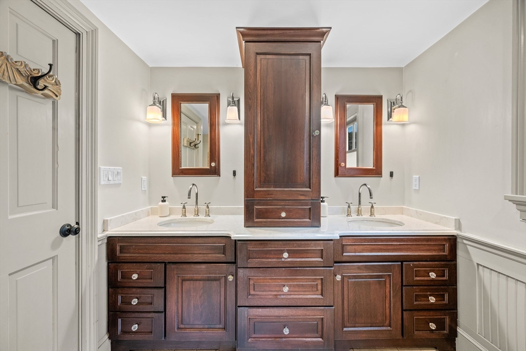 90 Dodge Street Beverly, MA 01915 - Photo 19 of 37 a bathroom with a sink vanity and mirror