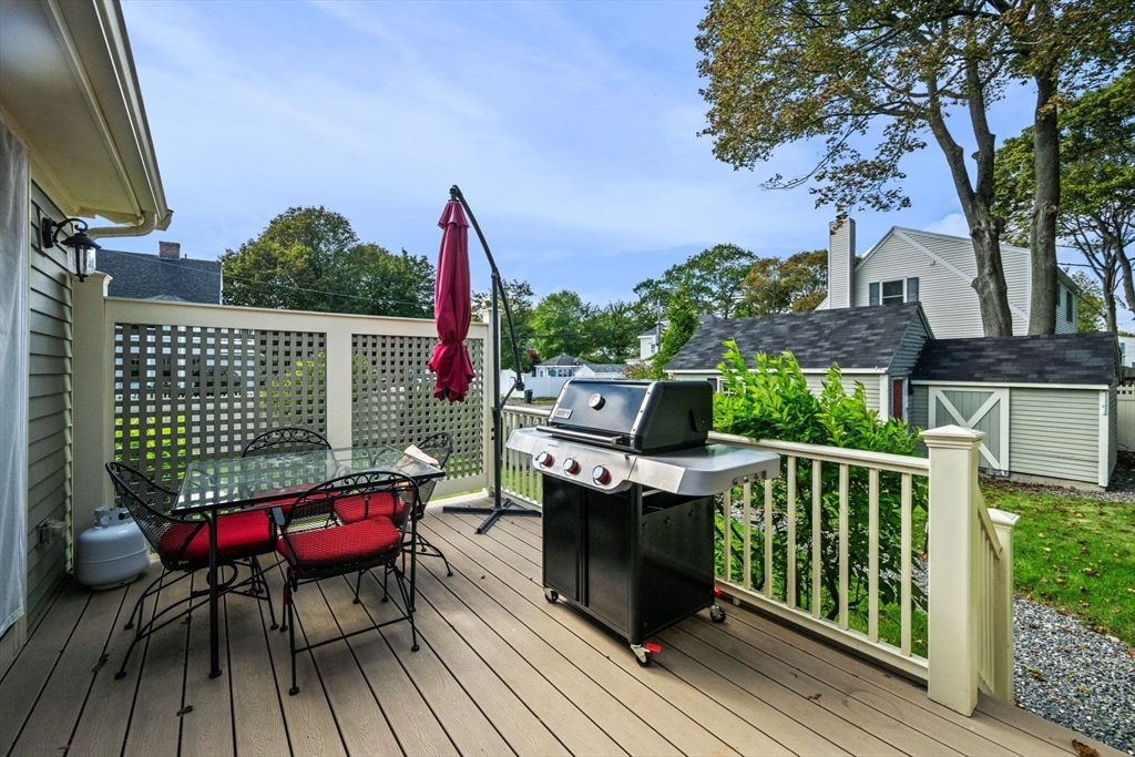 90 Dodge Street Beverly, MA 01915 - Photo 26 of 37 a view of a chairs on the roof deck