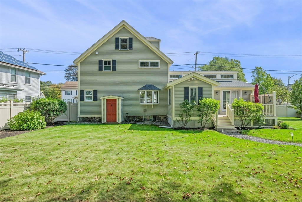 90 Dodge Street Beverly, MA 01915 - Photo 29 of 37 a front view of a house with a yard