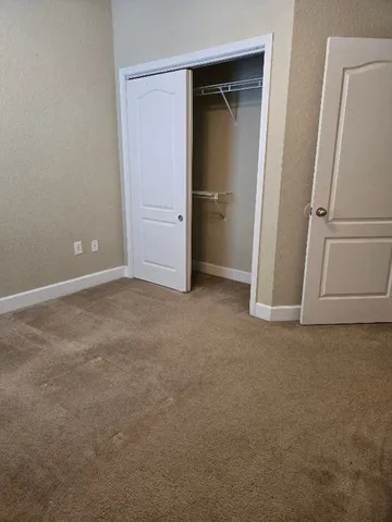 a view of hallway with shower