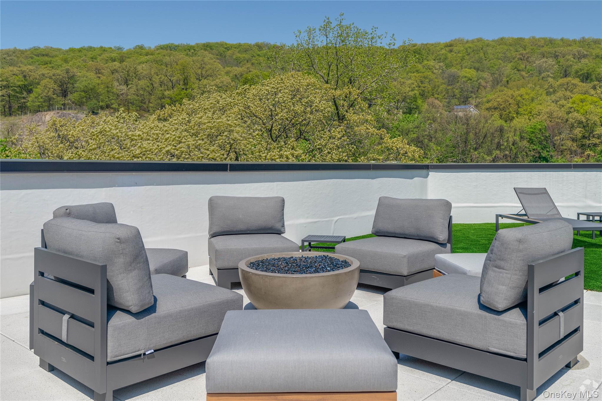 15 Washington Avenue, Unit 102 Suffern, NY 10901 - Photo 28 of 31 a view of a couch in the roof deck