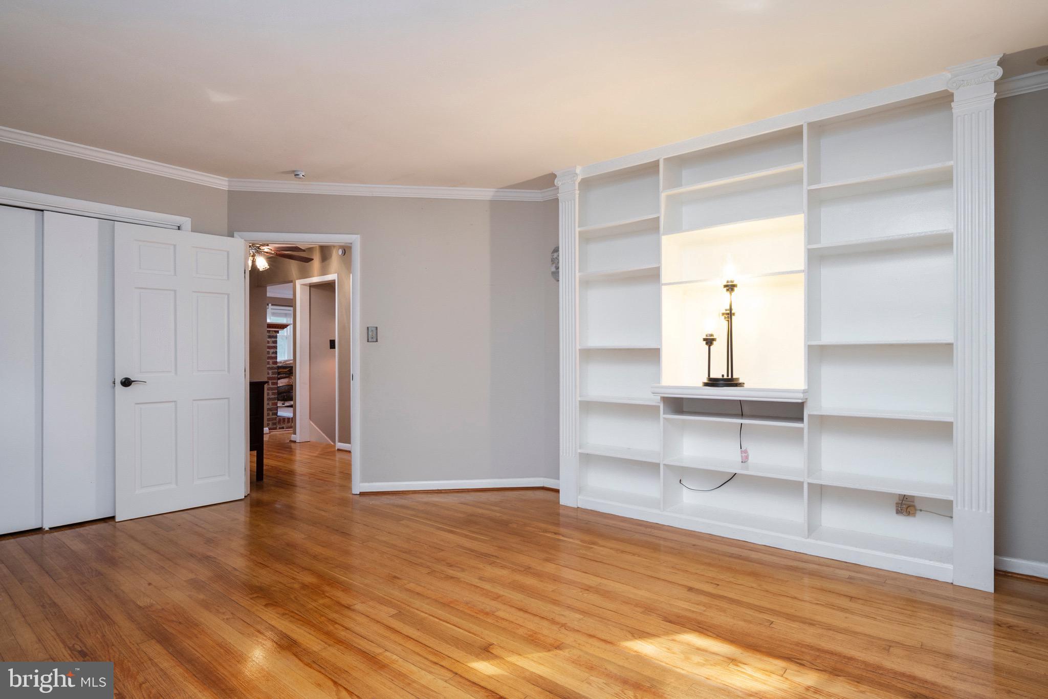 2807 Hambleton Road Riva, MD 21140 - Photo 35 of 55 a view of an empty room with wooden floor and closet
