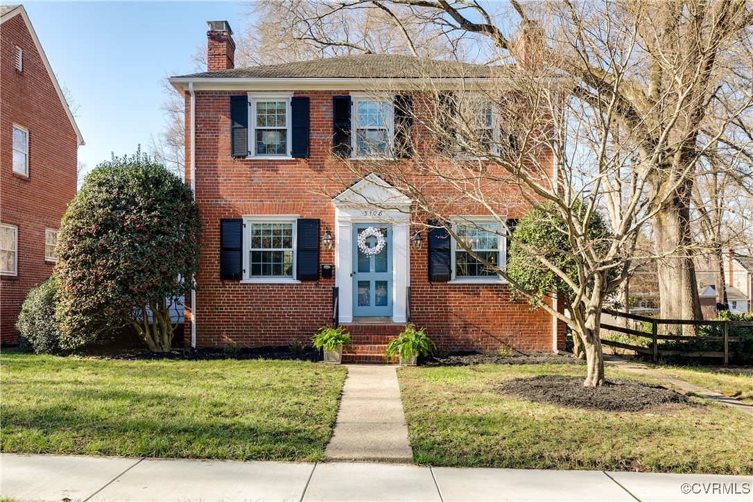 front view of house with a yard