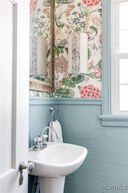 5108 King William Road Richmond, VA 23225 - Photo 16 of 38 a bathroom with a sink and a mirror