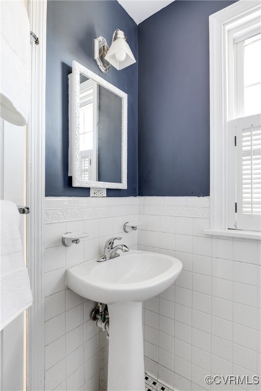 5108 King William Road Richmond, VA 23225 - Photo 23 of 38 a bathroom with a sink a mirror and a window