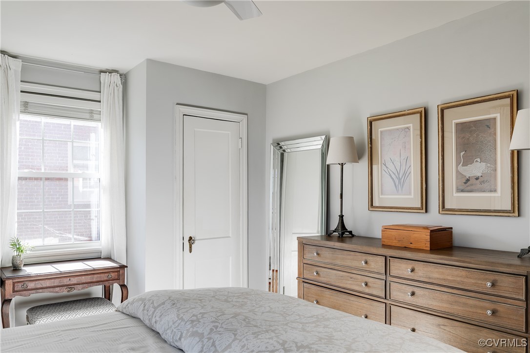 5108 King William Road Richmond, VA 23225 - Photo 30 of 38 a spacious bedroom with a bed and a window