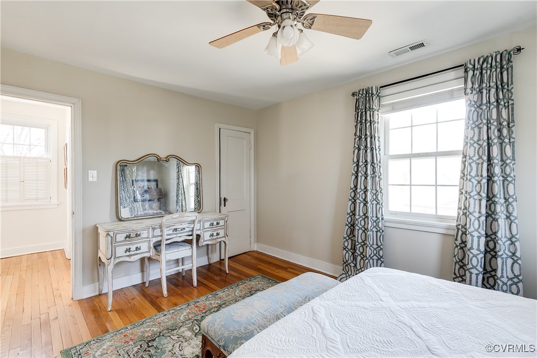 5108 King William Road Richmond, VA 23225 - Photo 32 of 38 a bedroom with a bed and wooden floor