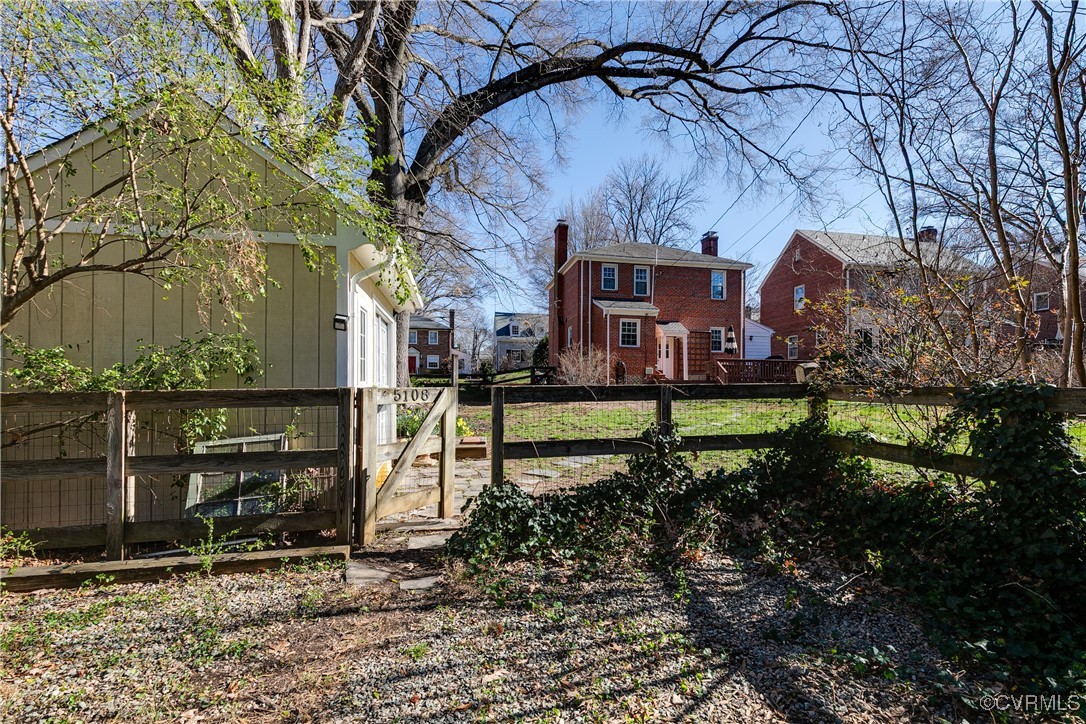 5108 King William Road Richmond, VA 23225 - Photo 38 of 38 a backyard of a house with lots of green space