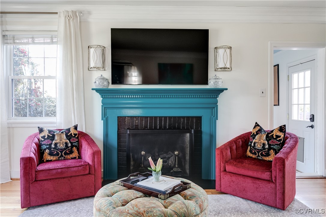 5108 King William Road Richmond, VA 23225 - Photo 4 of 38 a living room with furniture and a fireplace