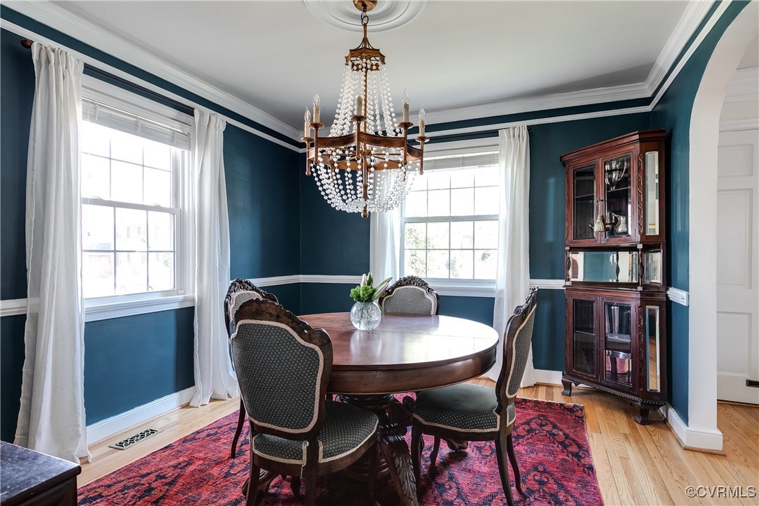 5108 King William Road Richmond, VA 23225 - Photo 10 of 38 a view of a dining room with furniture window and wooden floor