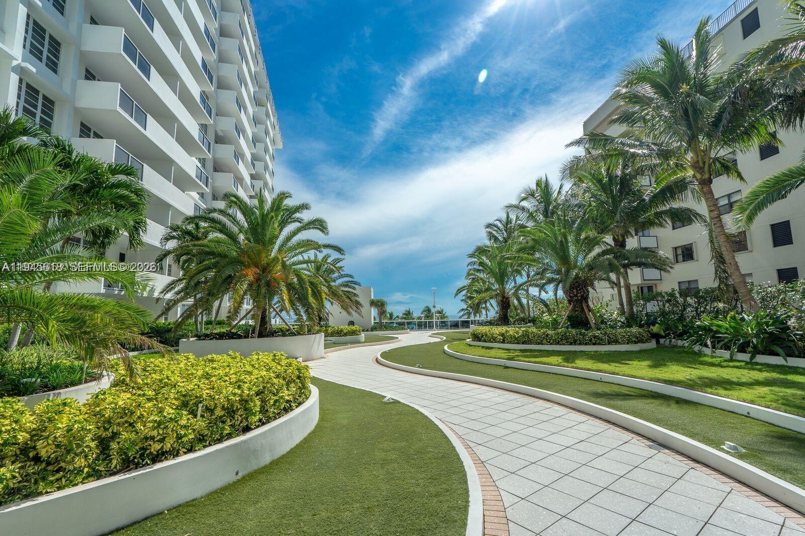 100 Lincoln Road, Unit 503 Miami Beach, FL 33139 - Photo 21 of 25 a view of a golf course with a trees