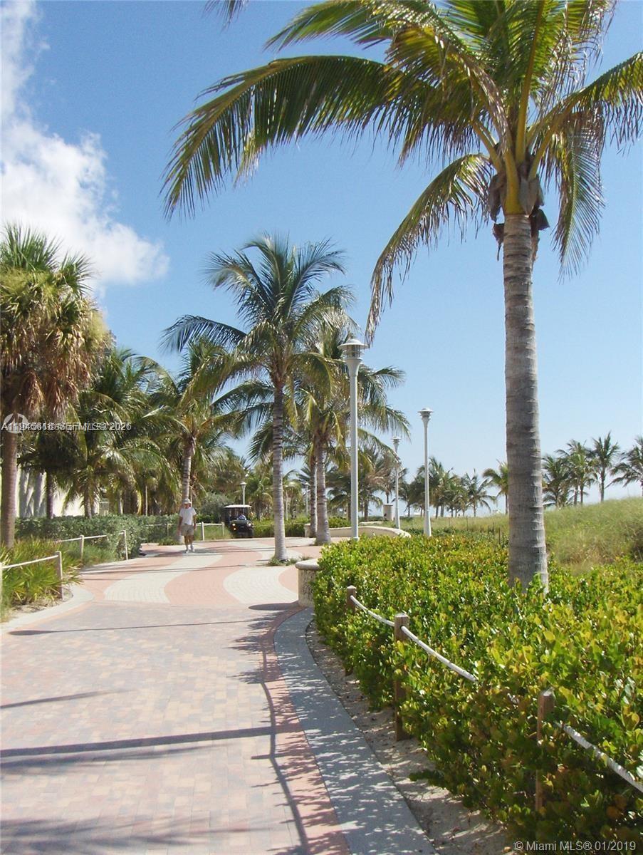 100 Lincoln Road, Unit 503 Miami Beach, FL 33139 - Photo 22 of 25 a view of a garden and palm trees