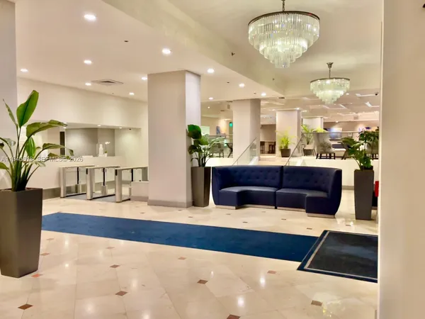a view of living room and kitchen