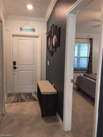 a view of a livingroom with furniture and windows