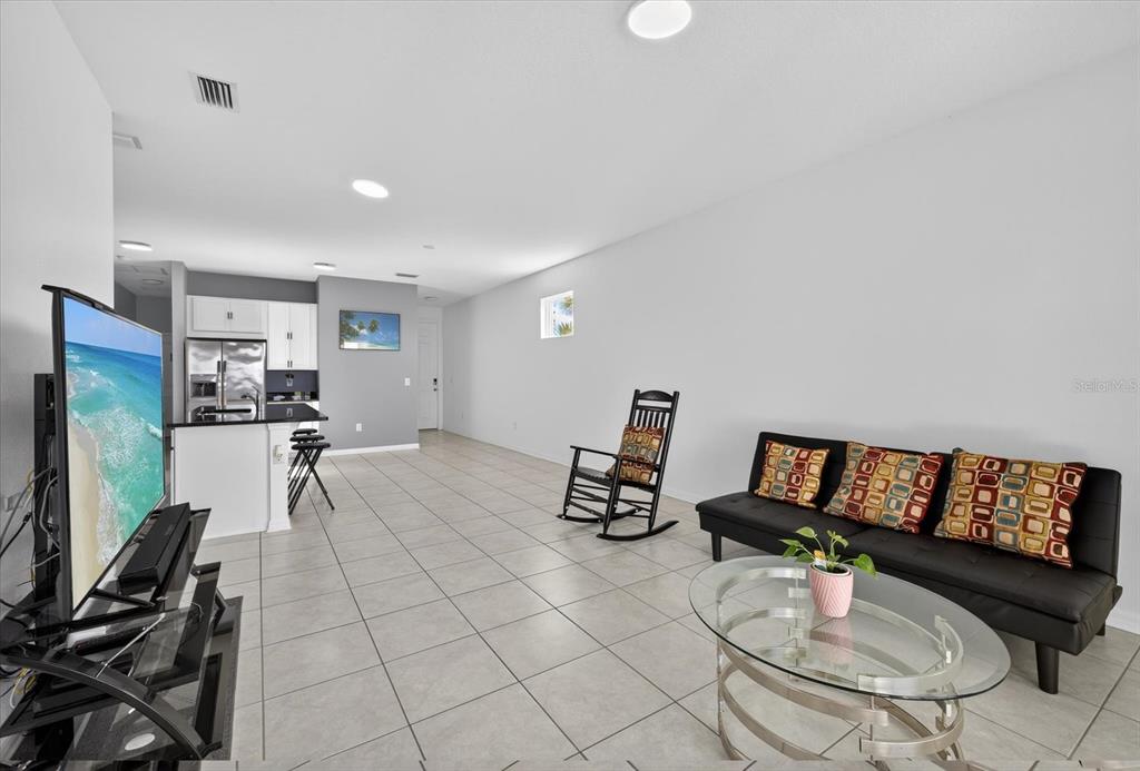 11883 Brighton Knoll Loop Riverview, FL 33579 - Photo 6 of 45 a living room with furniture