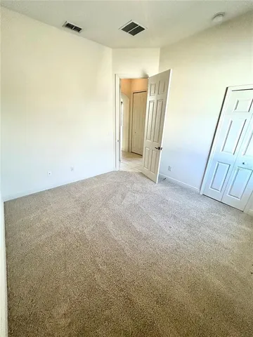 a kitchen with stainless steel appliances granite countertop a refrigerator stove and cabinets