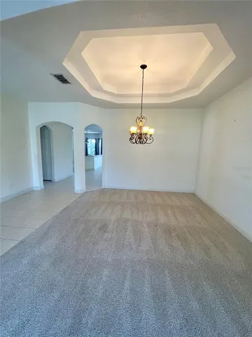 an empty room with a fireplace