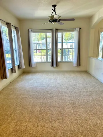 a spacious bathroom with a double vanity sink a mirror and a shower