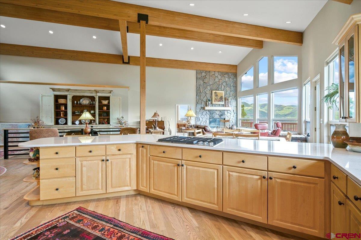 1600-2 Parcels) Elk Ridge Trail, Unit PARK ESTATES LOTS 4 AND 9 Ridgway, CO 81432 - Photo 12 of 39 a spacious bathroom with a sink and a large mirror