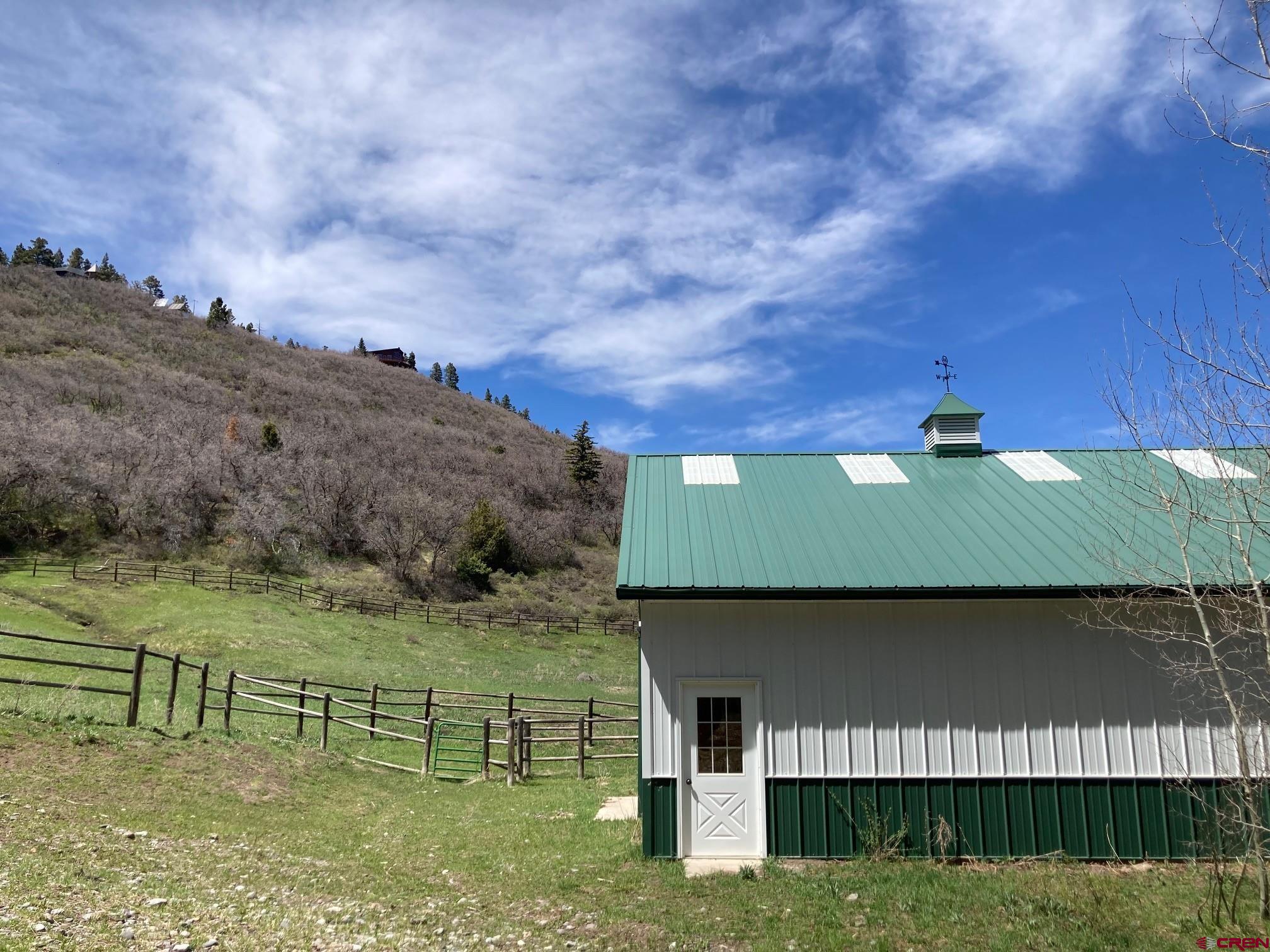 1600-2 Parcels) Elk Ridge Trail, Unit PARK ESTATES LOTS 4 AND 9 Ridgway, CO 81432 - Photo 21 of 39 an aerial view of a house