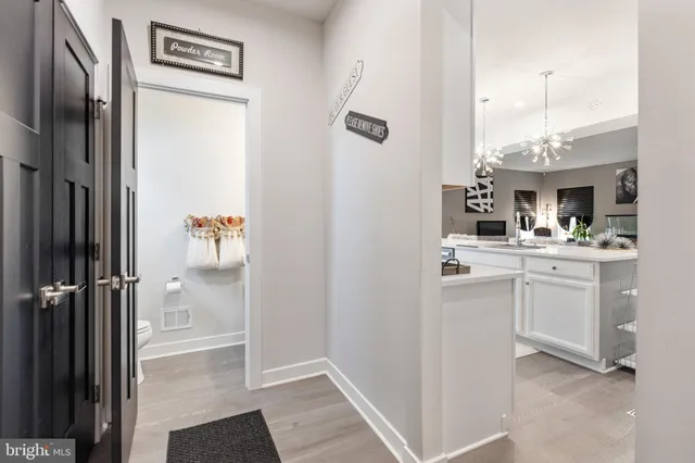 a bathroom with a sink and mirror