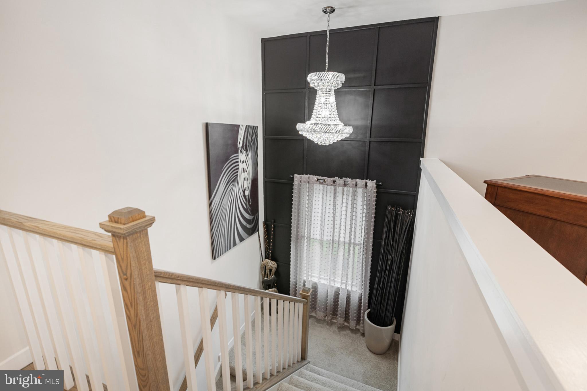 300 Jasper Way Middletown, DE 19709 - Photo 17 of 34 a view of entryway and hall with wooden floor