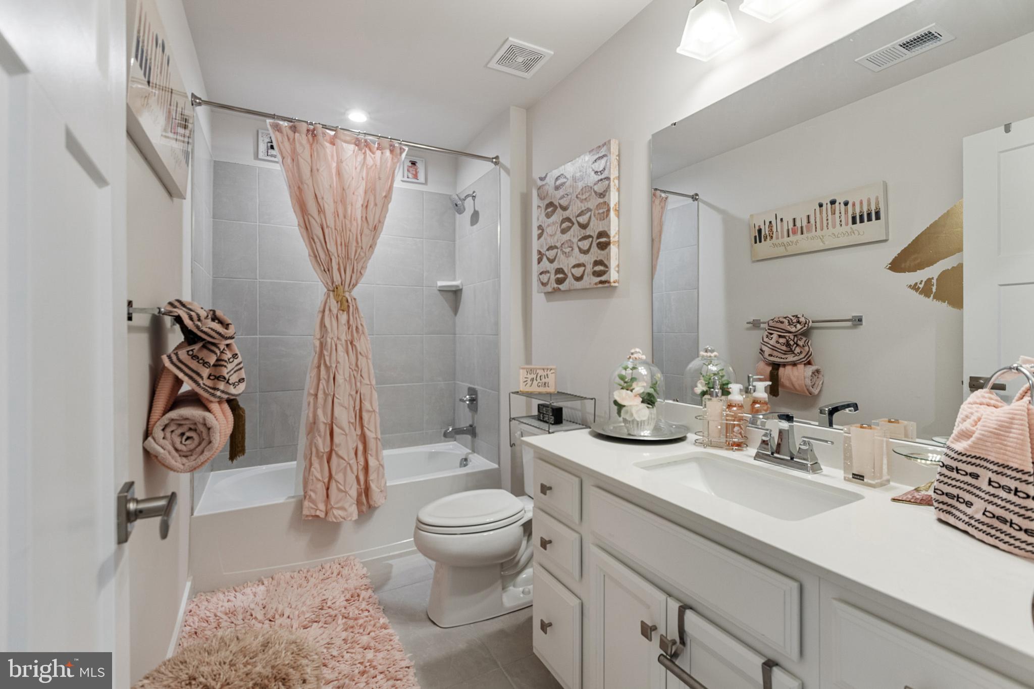 300 Jasper Way Middletown, DE 19709 - Photo 27 of 34 a bathroom with a sink toilet and shower