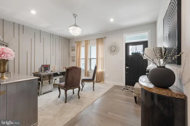 a work room with furniture and a window