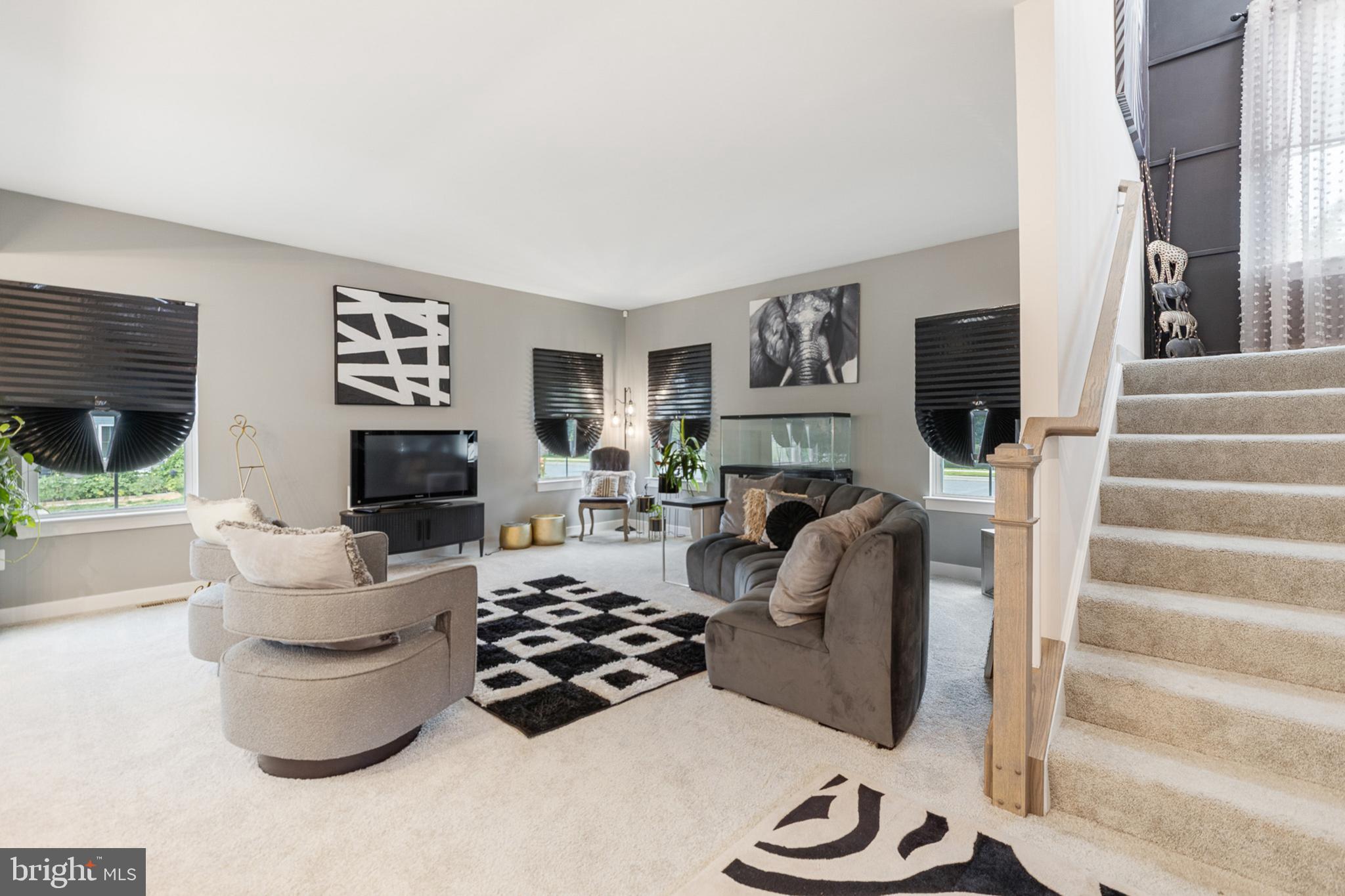 300 Jasper Way Middletown, DE 19709 - Photo 9 of 34 a living room with furniture and a fireplace