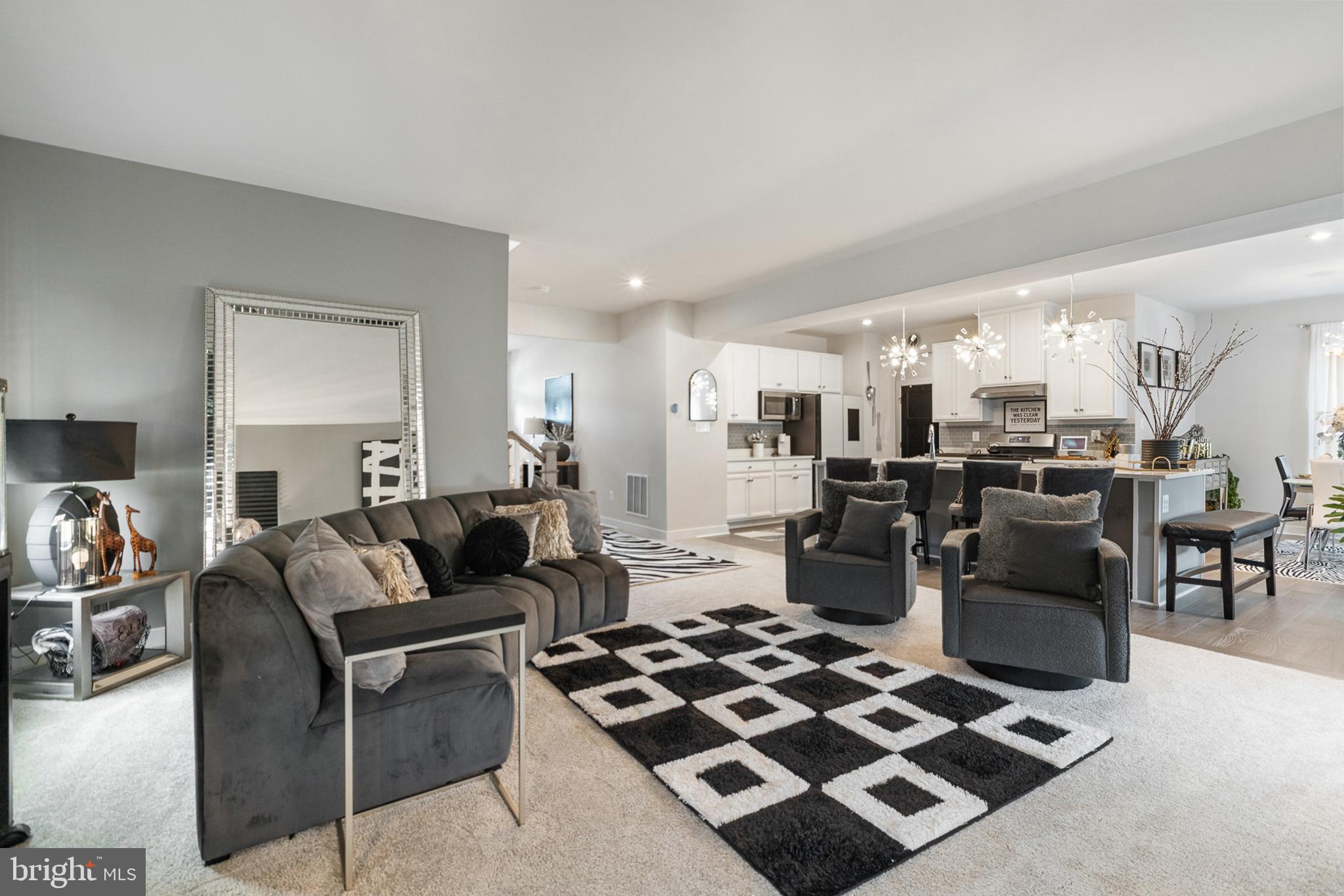 300 Jasper Way Middletown, DE 19709 - Photo 10 of 34 a living room with furniture and a rug