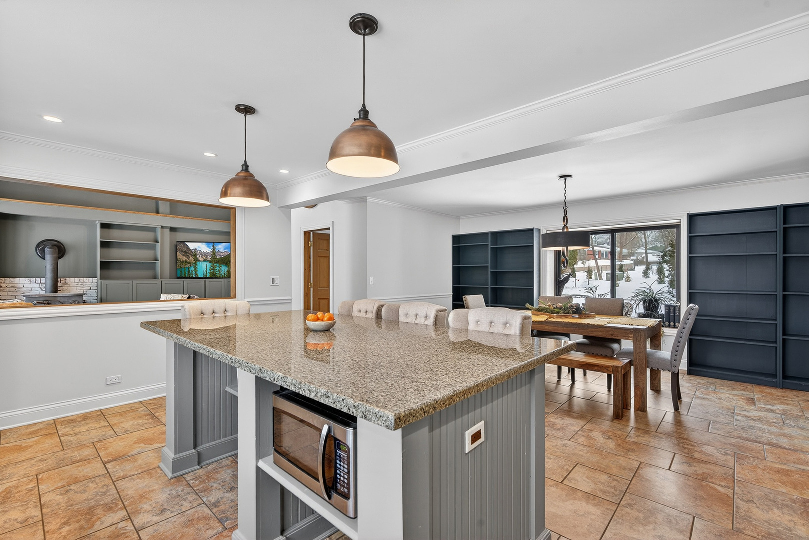 1275 Country Club Road Lake Zurich, IL 60047 - Photo 14 of 49 a kitchen with granite countertop stainless steel appliances a dining table and chairs